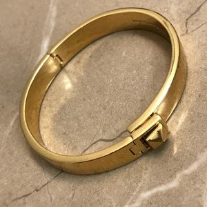 Kate Spade gold colored bangle - used.