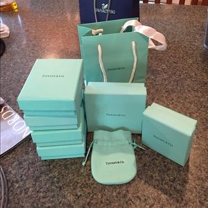 Tiffany and Co. Boxes (6), bag (1), and pouch (1).