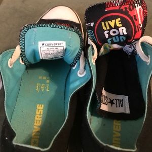 Teal lined Chuck Taylors