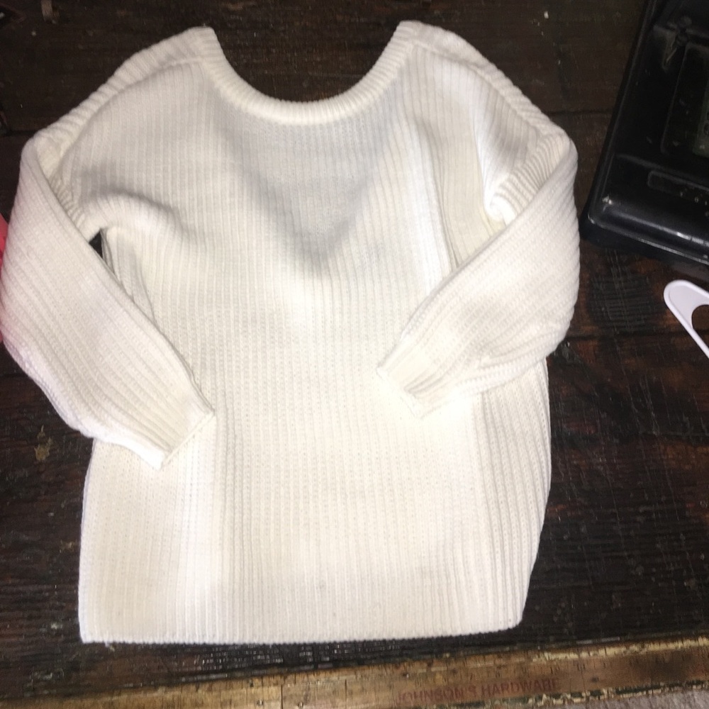 Oversized knot sweater with open back