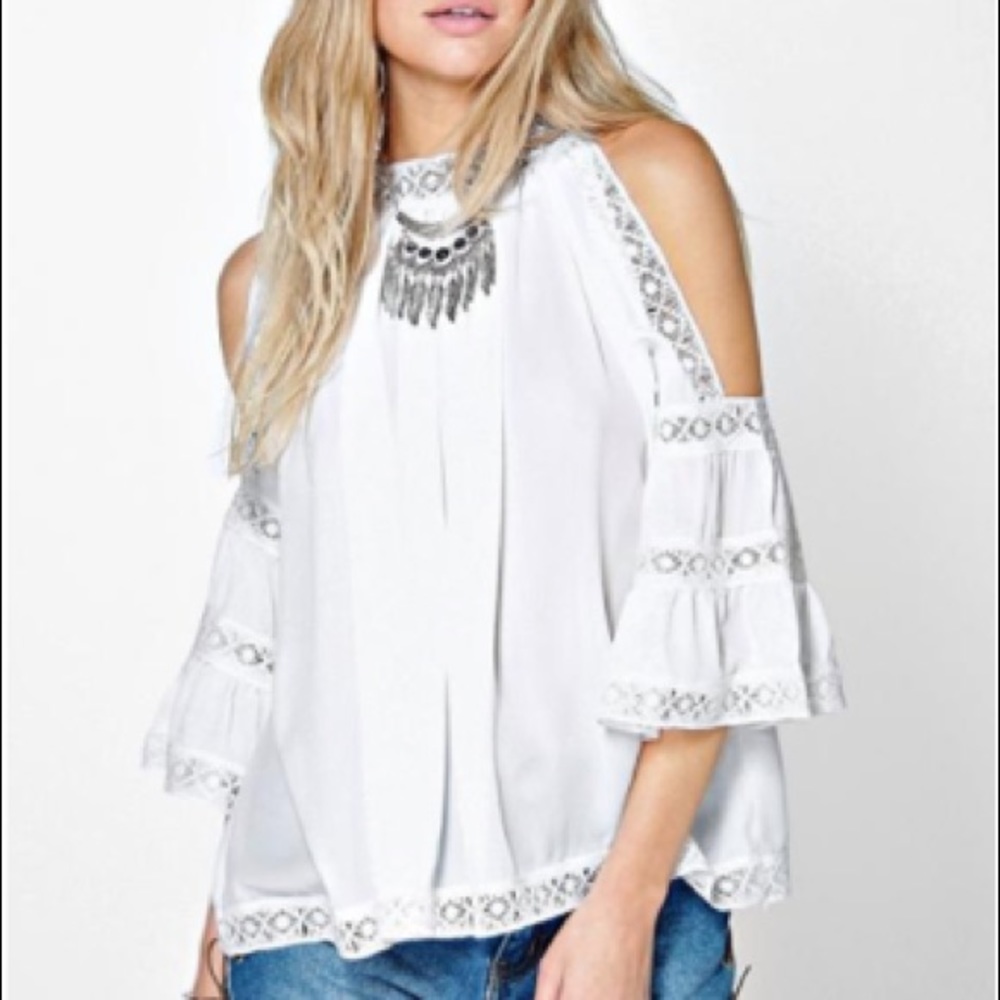 High neck open shoulder blouse with lace accents