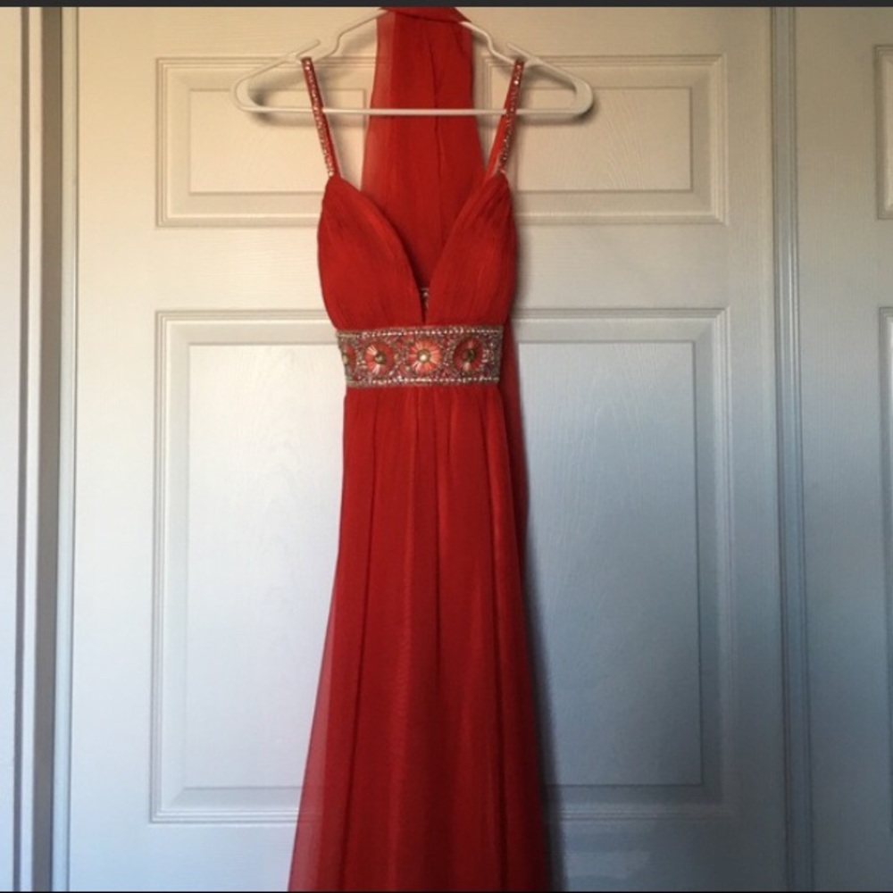 Beautiful red jeweled formal gown with scarf