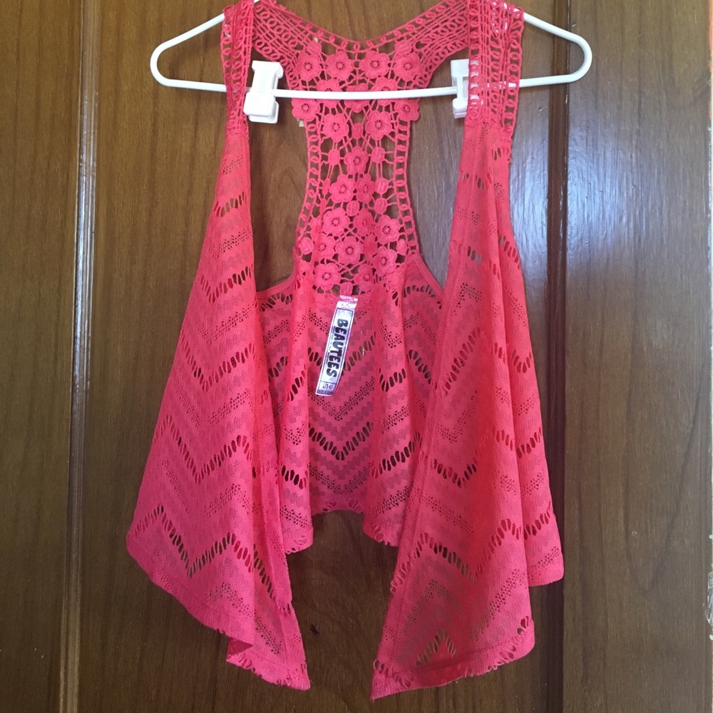 Coral shrug with floral print on the back side