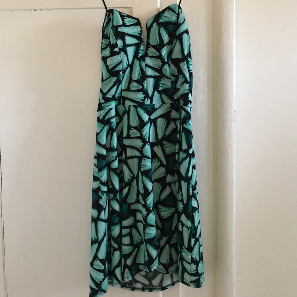 Green and black long top (sleeveless)