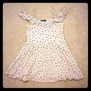 Flowy and flirty dusty rose daisy pattern sundress