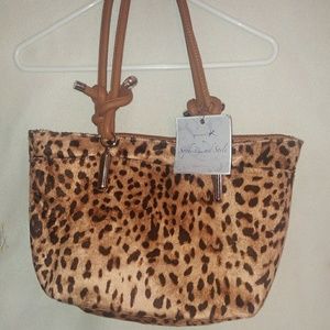 Women's sophisticated Youmi k handbag purse