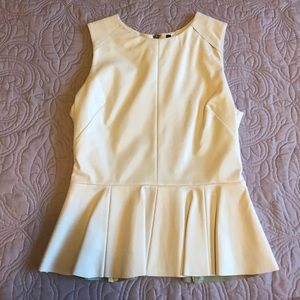 Super cute vegan leather peplum shell!