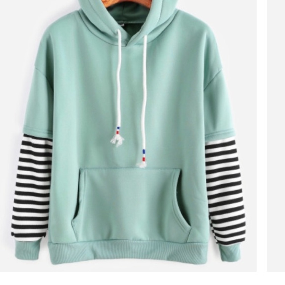 Turquoise sweatshirt with striped underlayer