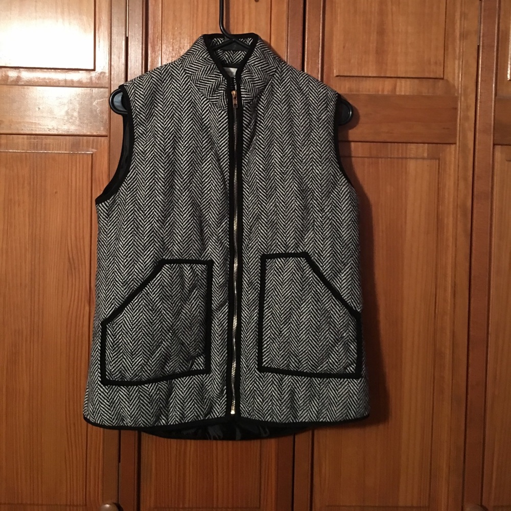 Black and white vest.