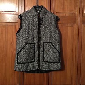 Black and white vest.