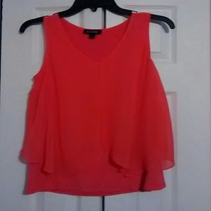 Sleeveless coral blouse