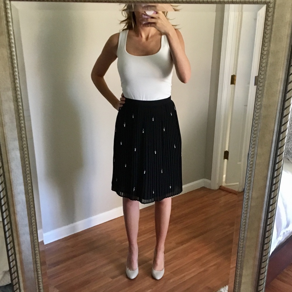 Black, pleated skirt with sparkle