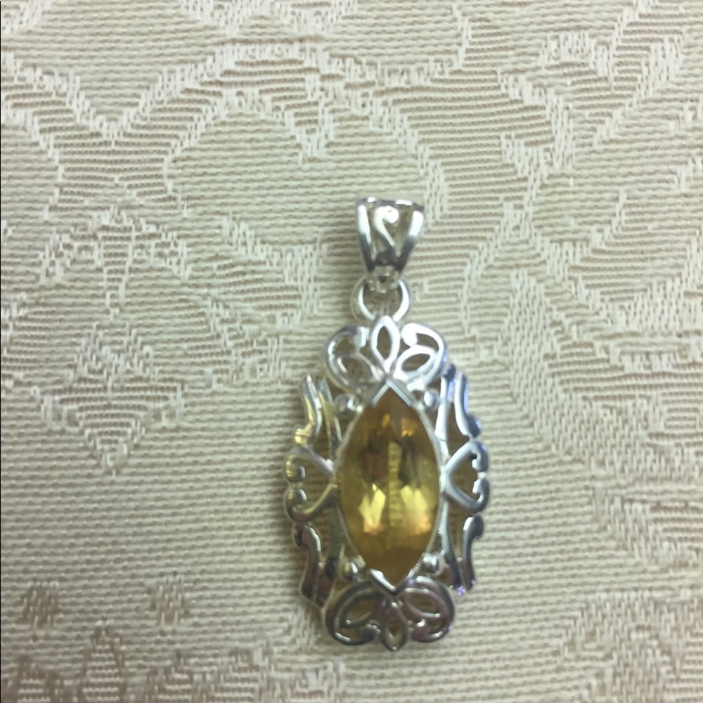 Citrine pendant set in stamped sterling silver