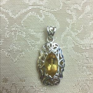 Citrine pendant set in stamped sterling silver