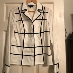 White with blue stripes in front shirt.