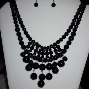Handmade black beaded bib necklace and earrings