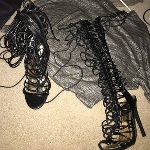 Lace up knee high heels