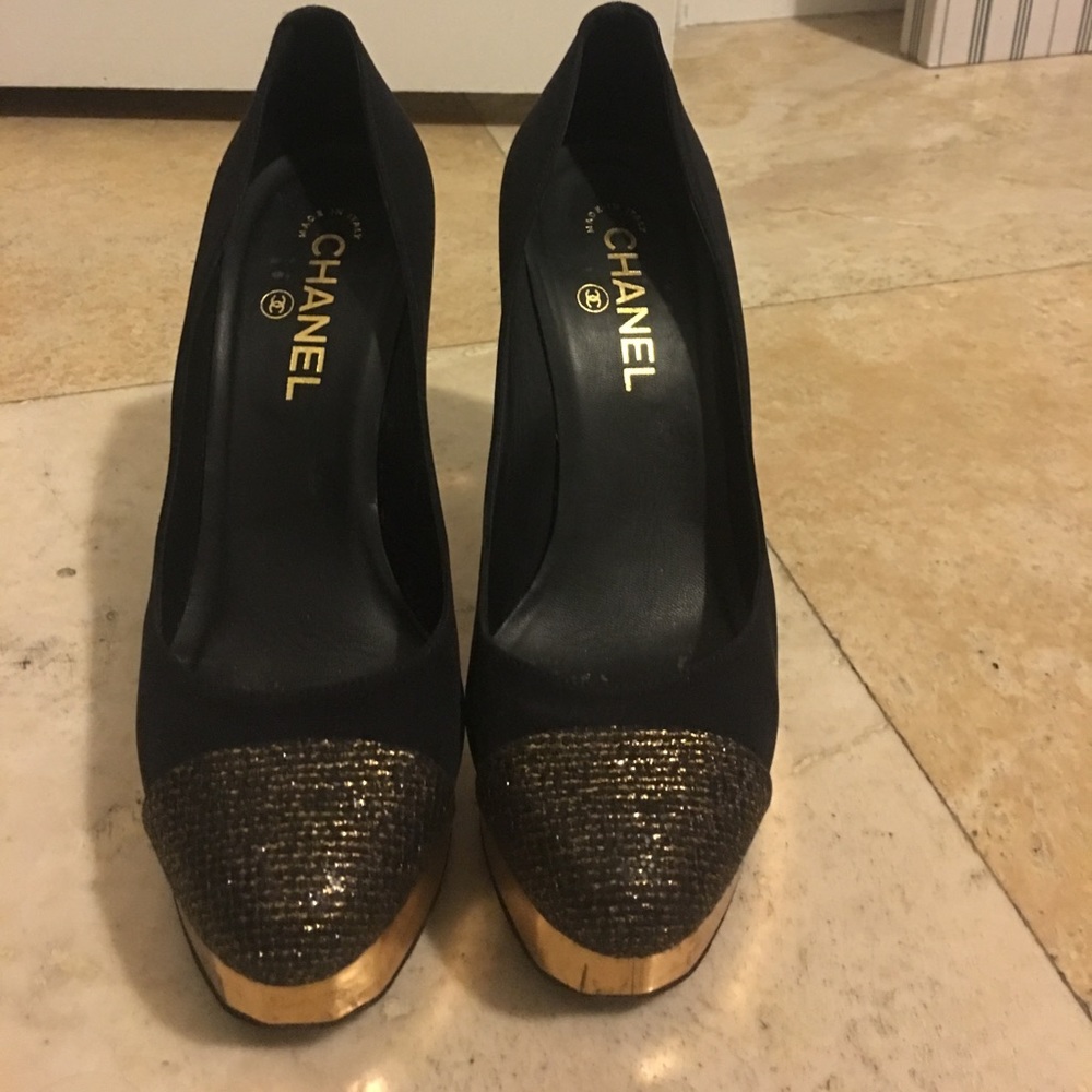 Chanel black and gold pumps