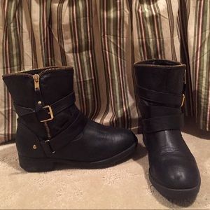 Black booties with zipper detail