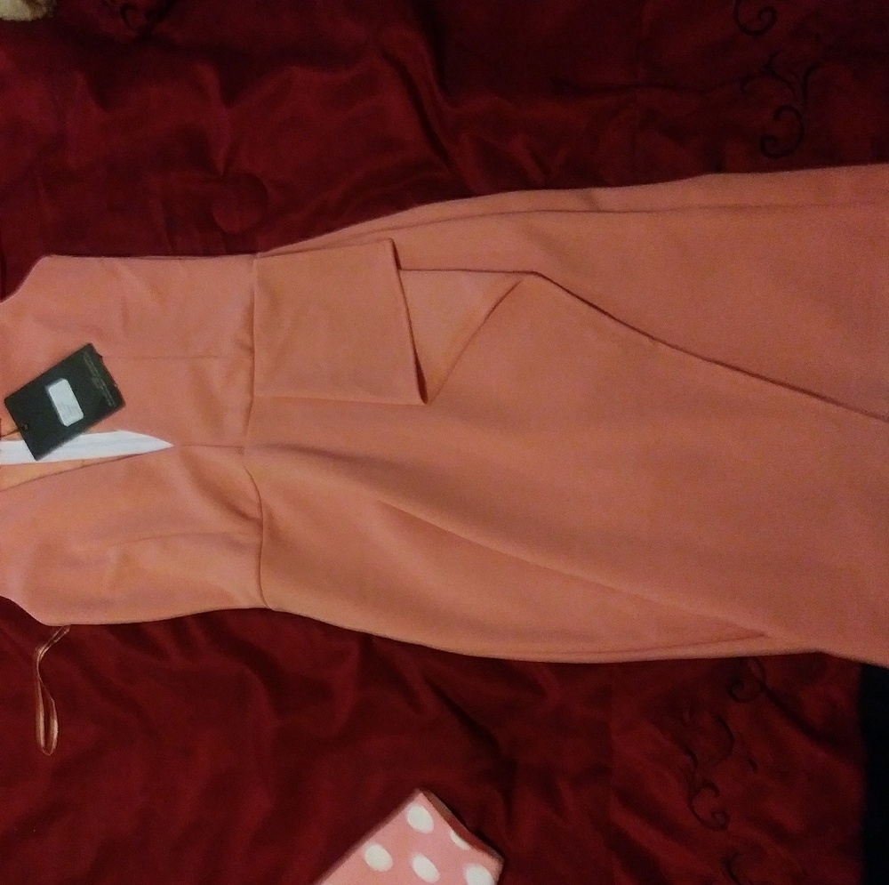 Flirty low v salmon dress