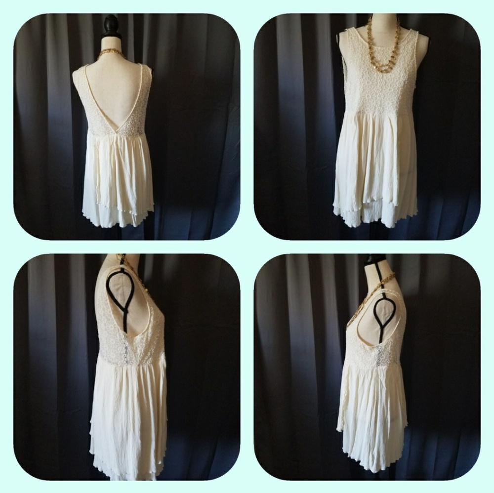 CREAM SLEEVELESS FULLY LINED DRESS W/TIERED BOTTOM