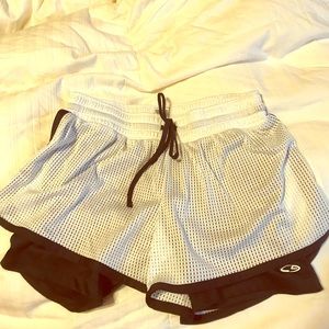 Clean shorts with built in spandex shorts