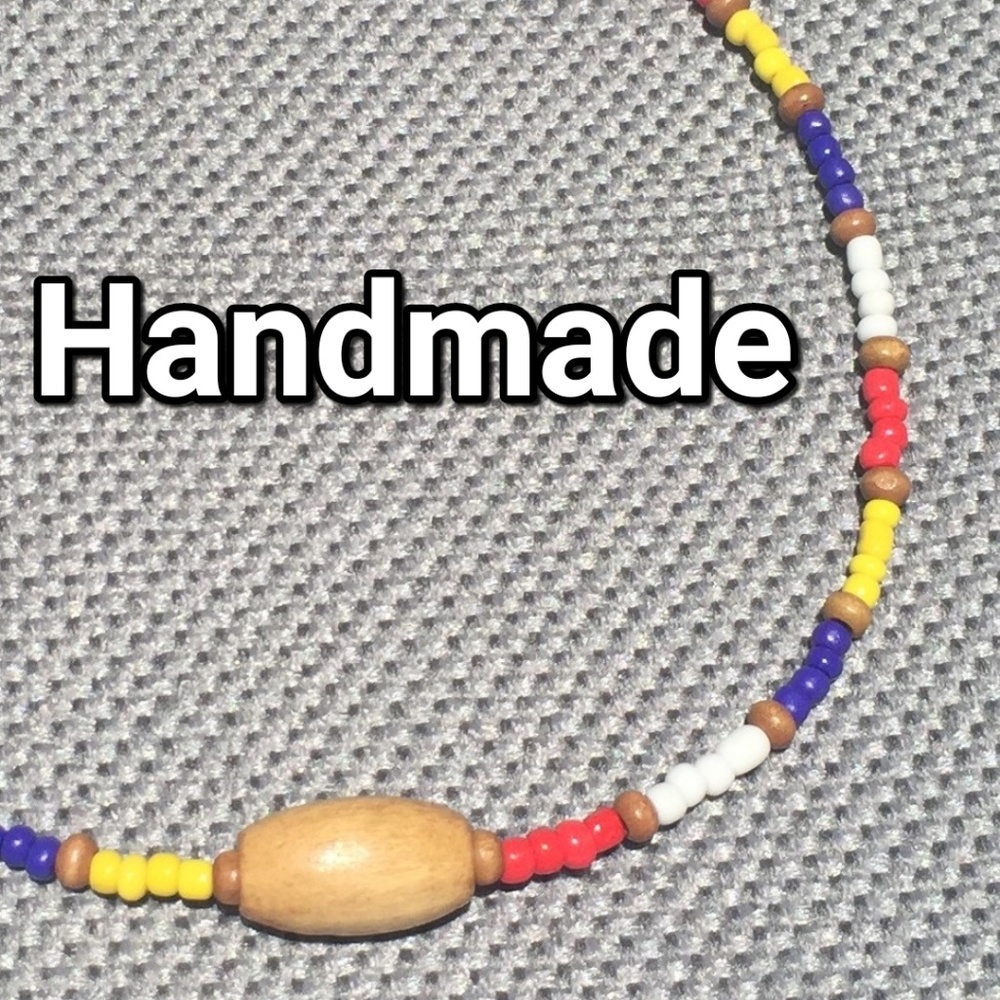 Handmade unisex surfer necklace. Red, blue, wood