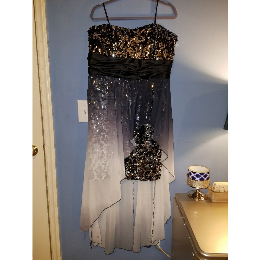 Beautiful sequined dress with short lace train