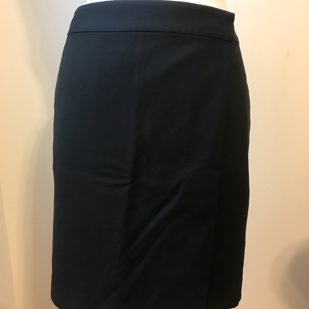 Black wrap skirt above the knee