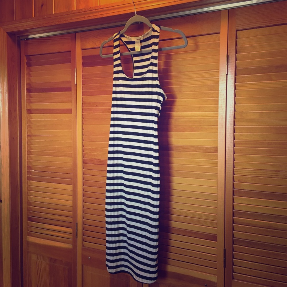 Black and white skin fitting dress.