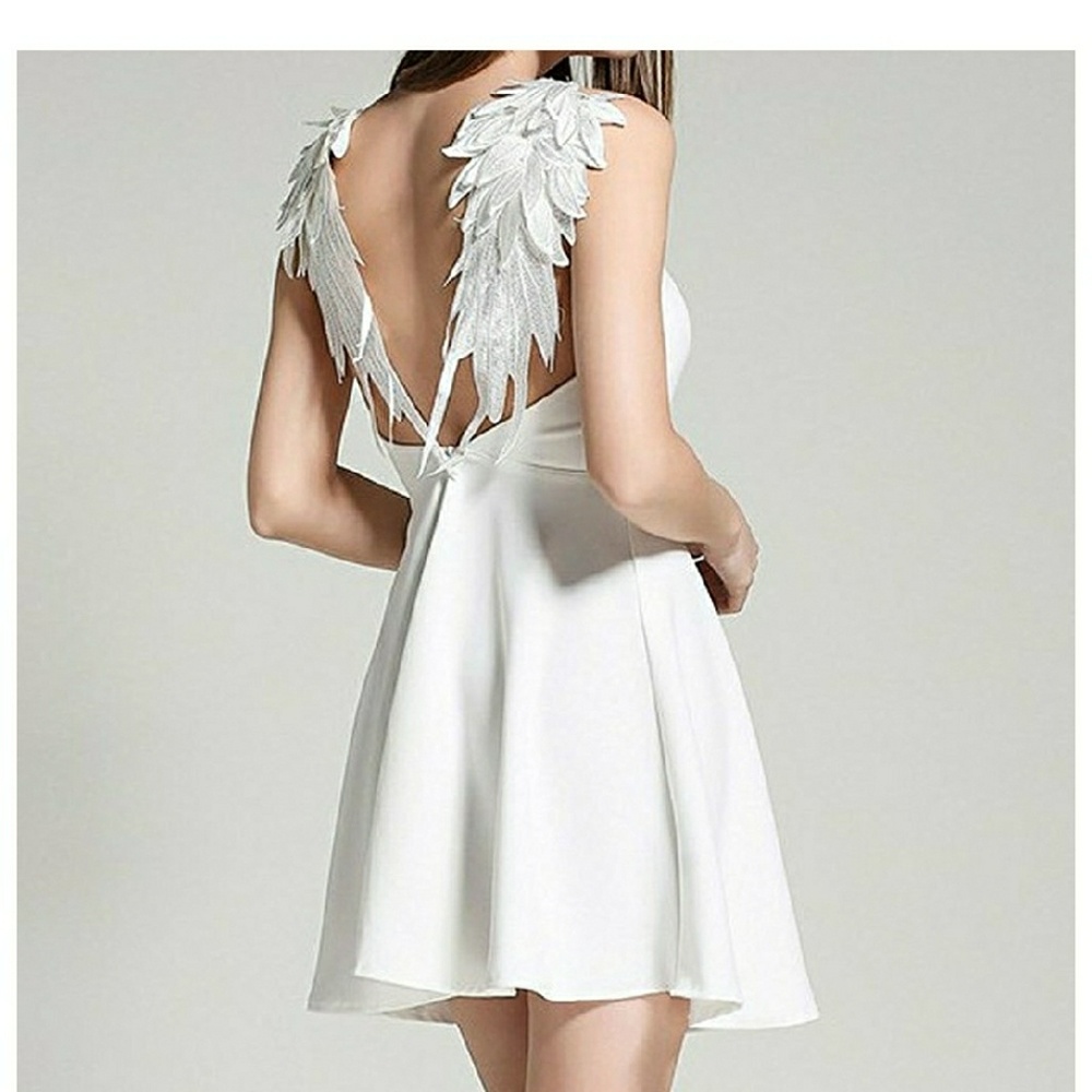 White skater dress with beautiful back detail
