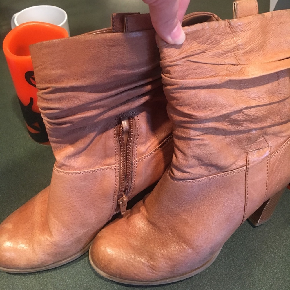 Nine West brown leather boots, worn.
