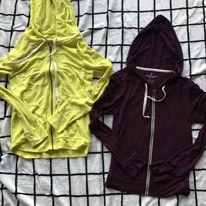 Two small American eagle zip ups