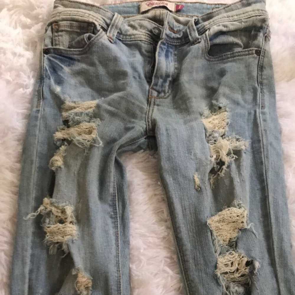 Mid rise ripped skinny jeans