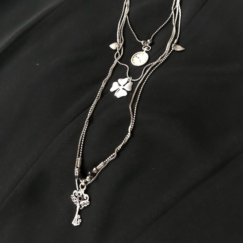 Long silver necklace from chic Paris Boutique