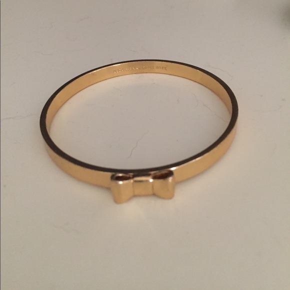 kate spade Jewelry - NWOT Gold Kate Spade Bangle with Bow