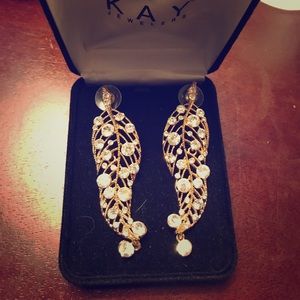 Costume jewelry gold leaves with diamond earrings