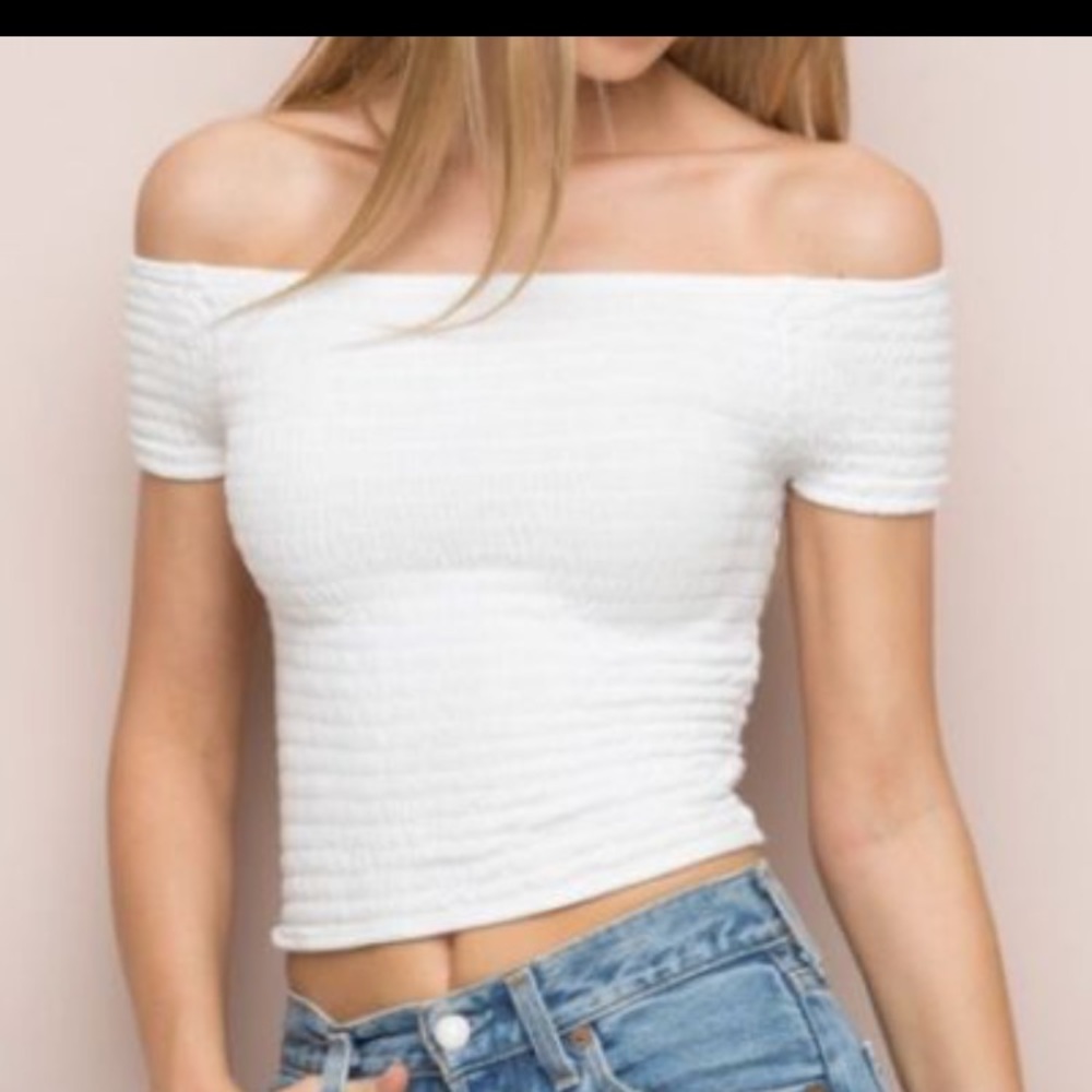 Tight white crop top off the shoulders