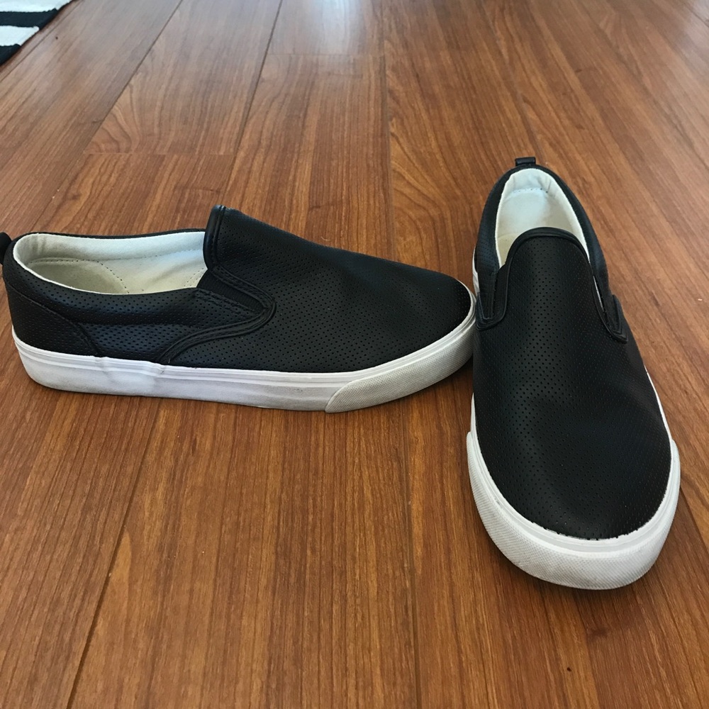 Black perforated slip on sneakers