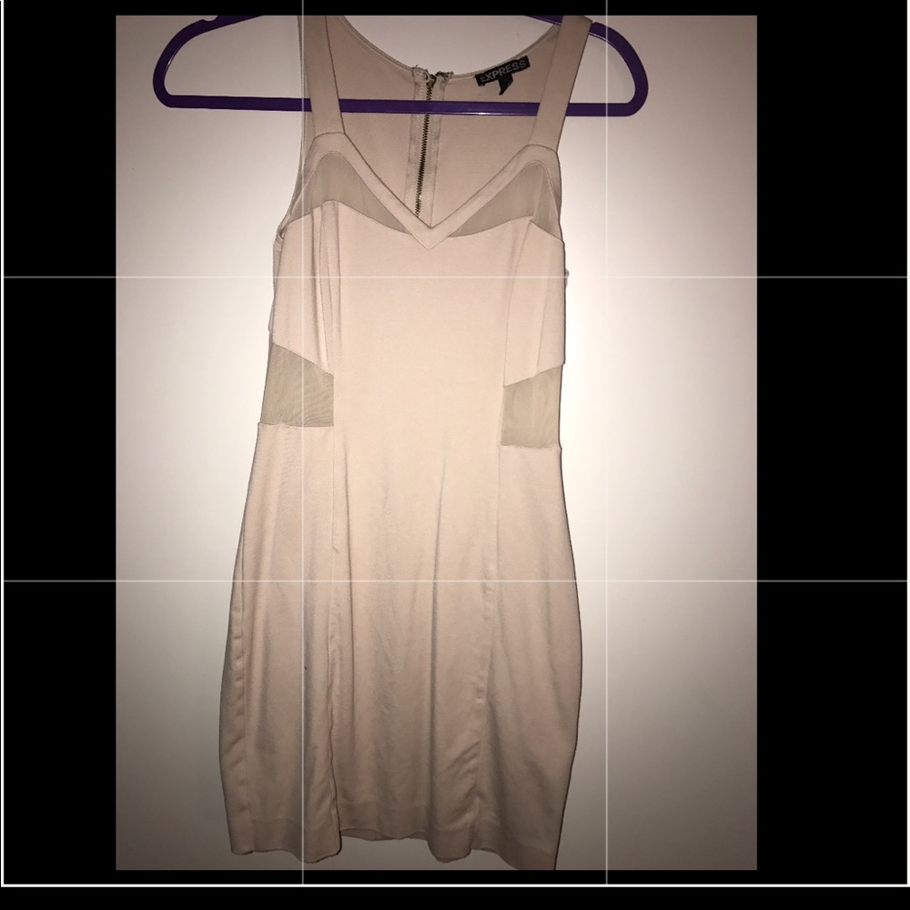 Super cute dress with sheer sides and back