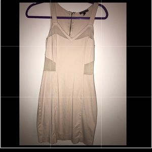 Super cute dress with sheer sides and back