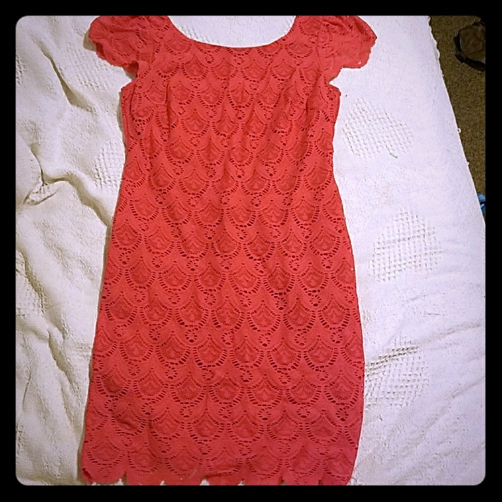 Medium length red dress