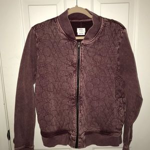 RVCA worn purple bomber jacket