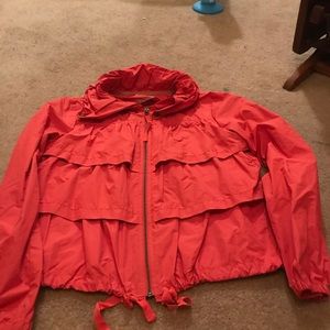 Red wind breaker.