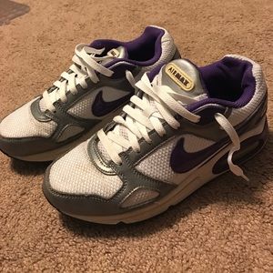 Purple and silver nikes