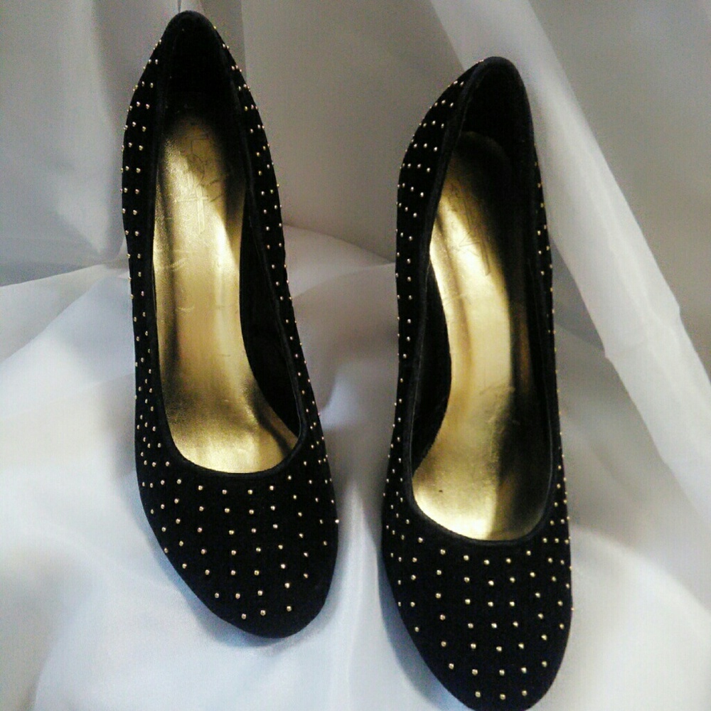 Fahrenheit black with gold stud heels.