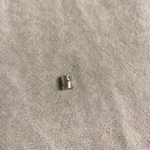 Silver pandora cola charm
