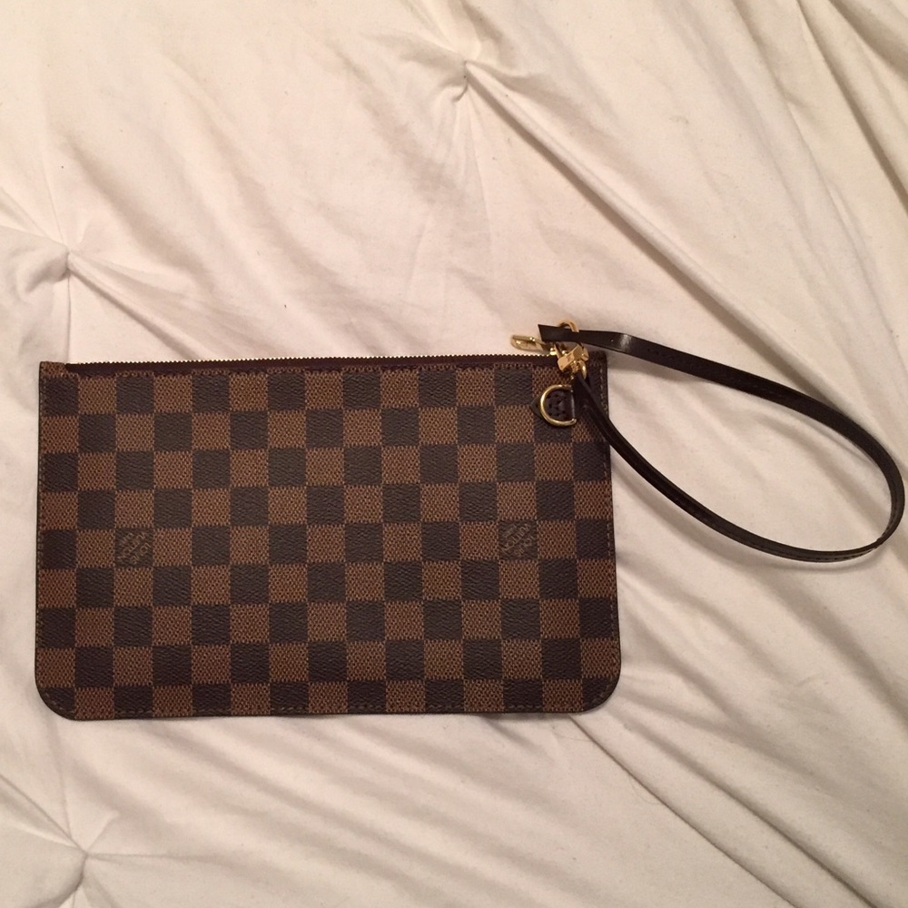 Louis Vuitton pouch. Authentic with receipt