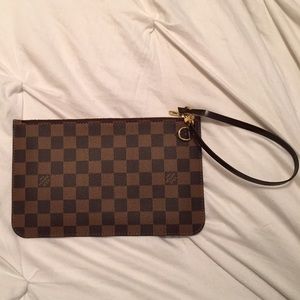 Louis Vuitton pouch. Authentic with receipt