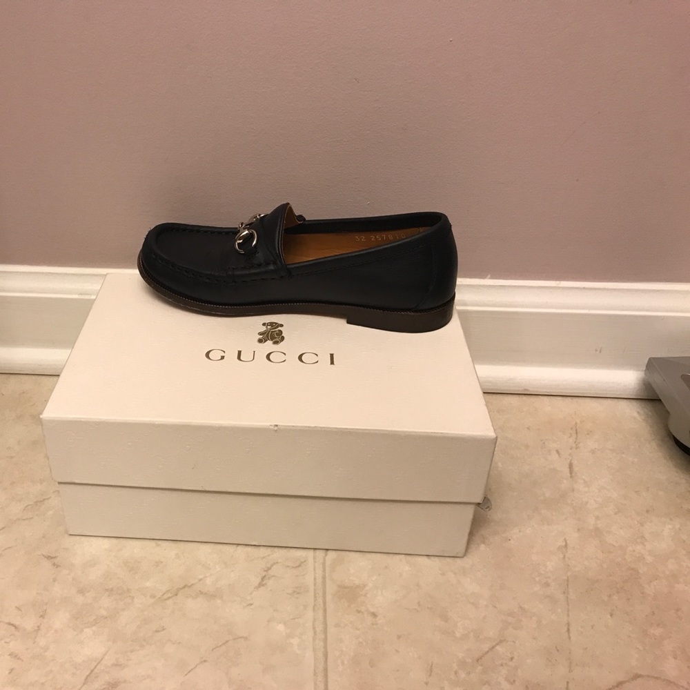 Black Gucci loafers